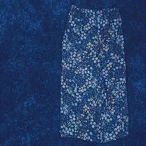 Black pants with floral print and elastic waistband